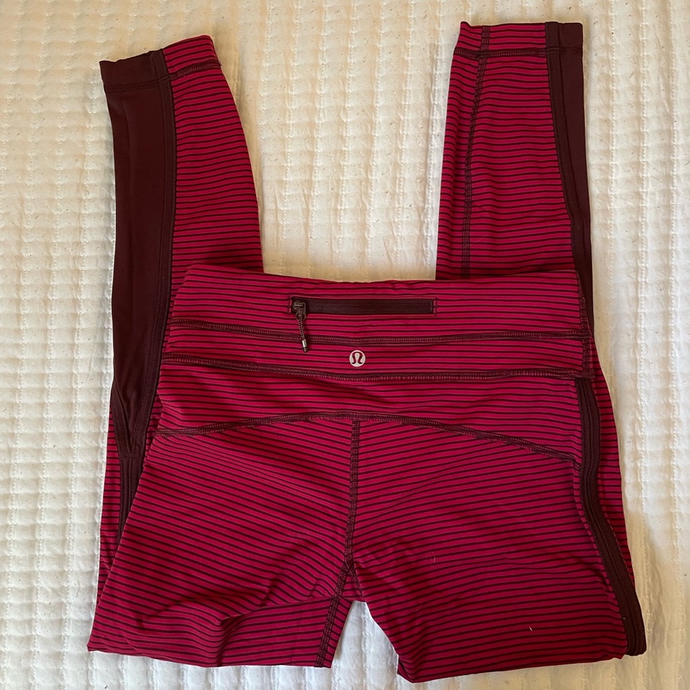 size 4 Lululemon leggings in excellent condition! RARE berry stripe color.